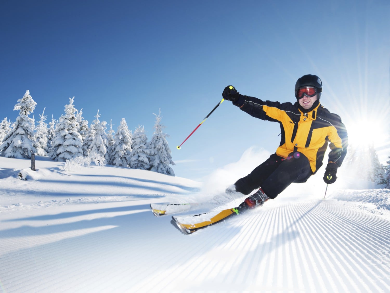 person skiing down a hill